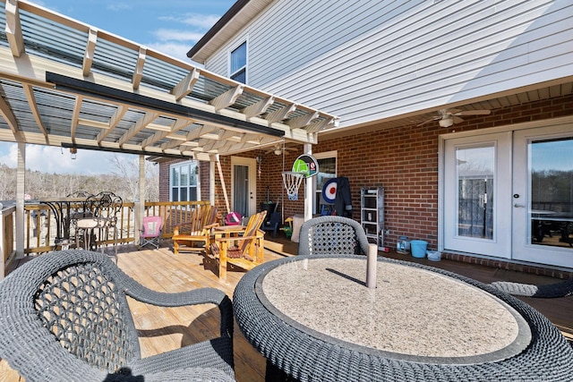 view of patio / terrace with french doors, a pergola, and a wooden deck