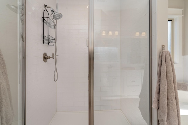 bathroom featuring an enclosed shower