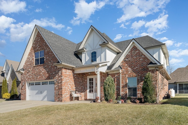 view of front of home featuring a garage and a front yard