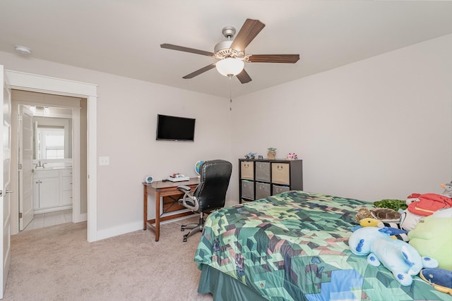 carpeted bedroom featuring sink and ceiling fan