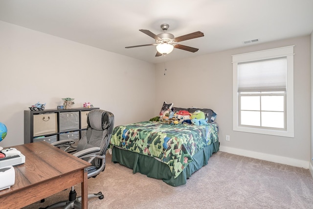 carpeted bedroom with ceiling fan