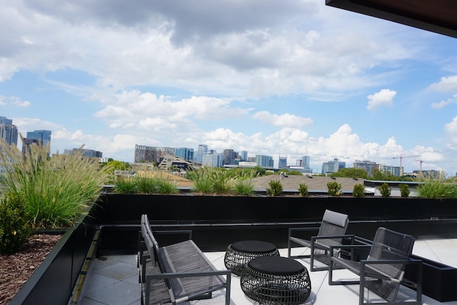 view of patio / terrace with a balcony