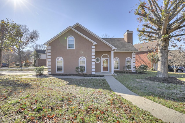 view of front property with a front yard