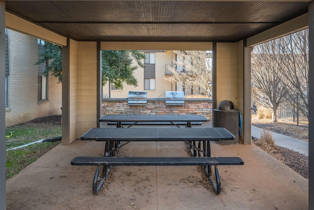 view of patio / terrace with grilling area and an outdoor kitchen