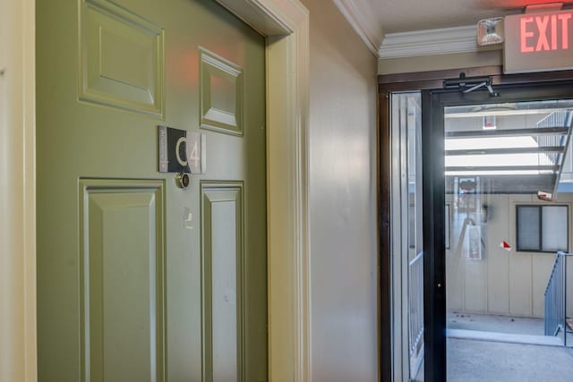 corridor featuring ornamental molding