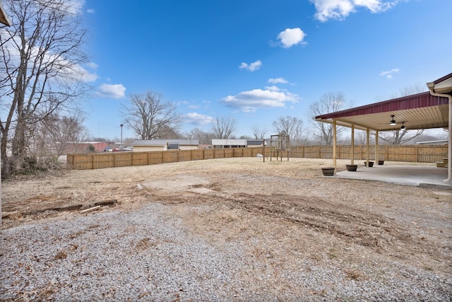 view of yard with ceiling fan