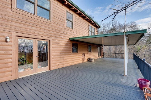 wooden deck featuring french doors