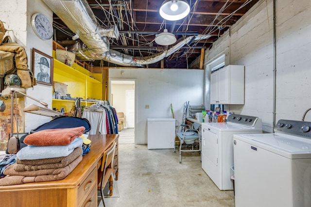 laundry area with washing machine and dryer