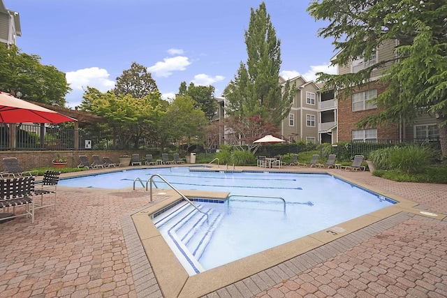 view of swimming pool featuring a patio