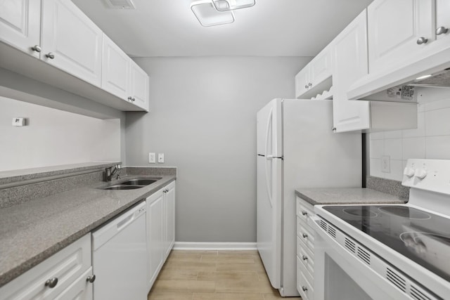 kitchen with sink, white cabinets, and white appliances