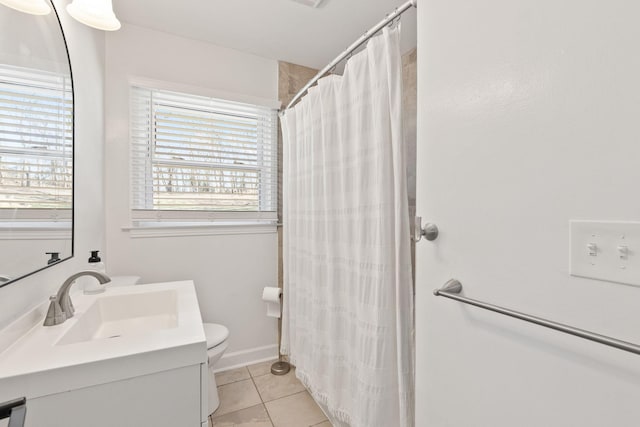 bathroom with a shower with curtain, vanity, toilet, and tile patterned flooring