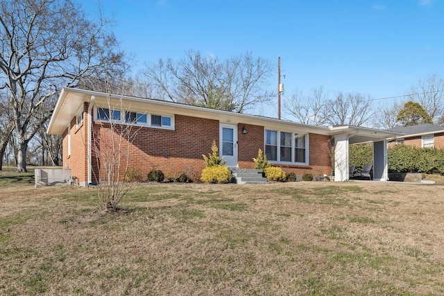 ranch-style home with a front yard