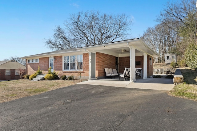 view of front of home featuring a carport