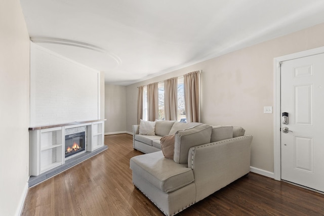 living room with dark hardwood / wood-style flooring