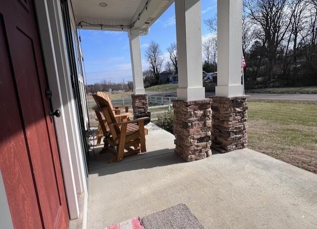 view of patio featuring covered porch