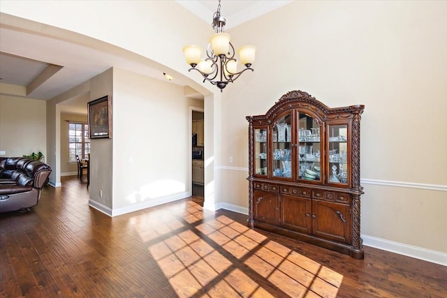 dining room with an inviting chandelier and wood-type flooring