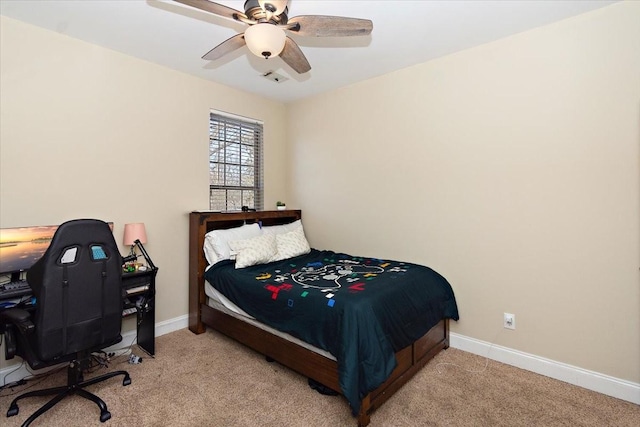 bedroom with light carpet and ceiling fan