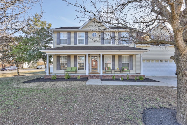 view of front facade with a porch and a garage