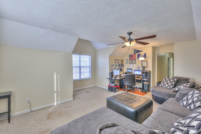 carpeted living room with ceiling fan, lofted ceiling, and a textured ceiling