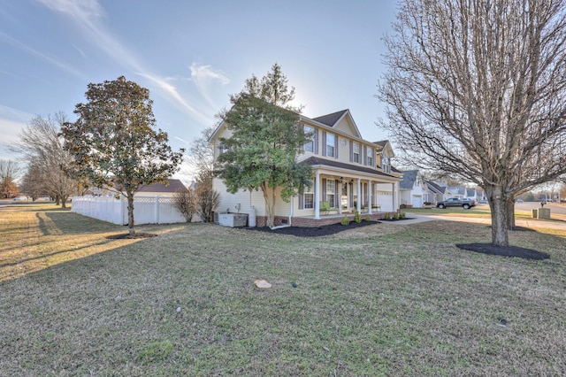 view of front of property with a porch and a front yard