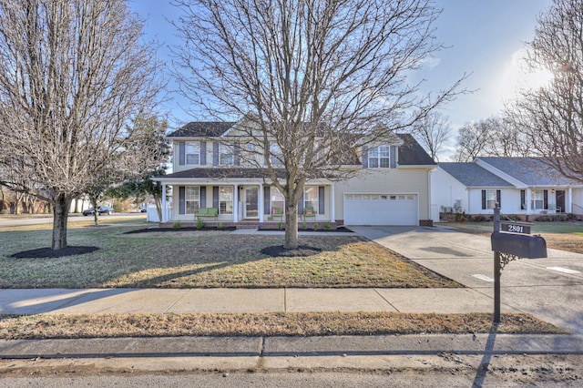 view of front facade with a garage and a front yard