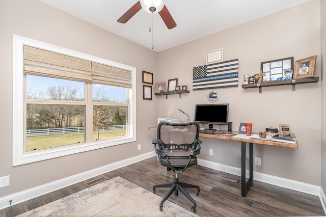 office featuring dark wood-type flooring and ceiling fan