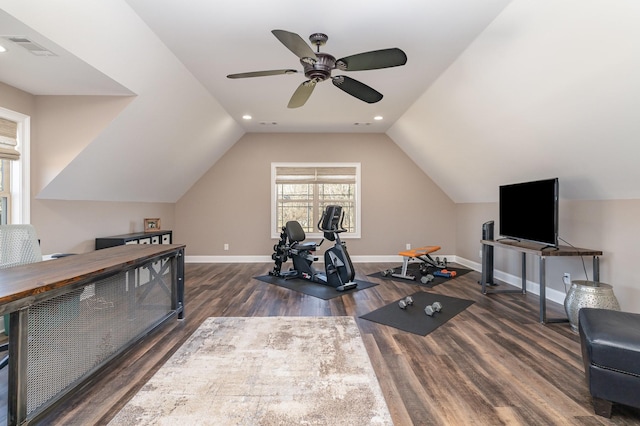 workout area featuring vaulted ceiling, ceiling fan, and dark hardwood / wood-style flooring