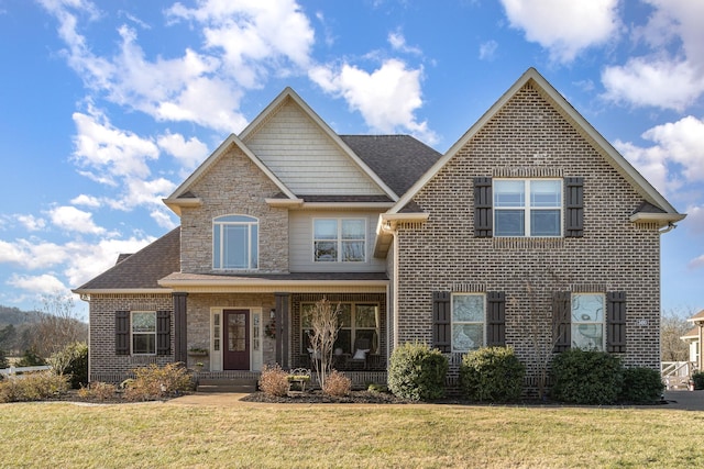 view of front of home featuring a front lawn