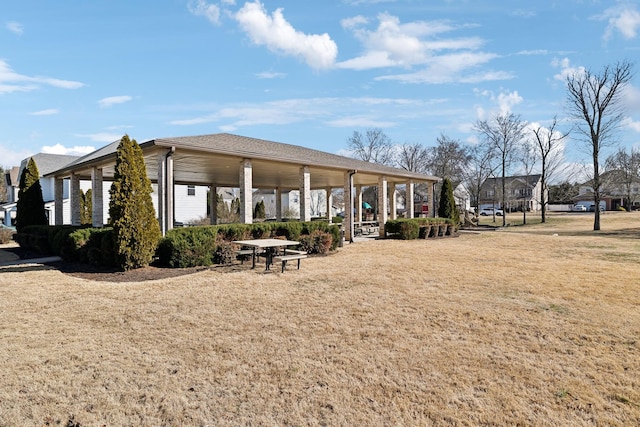 view of home's community featuring a lawn