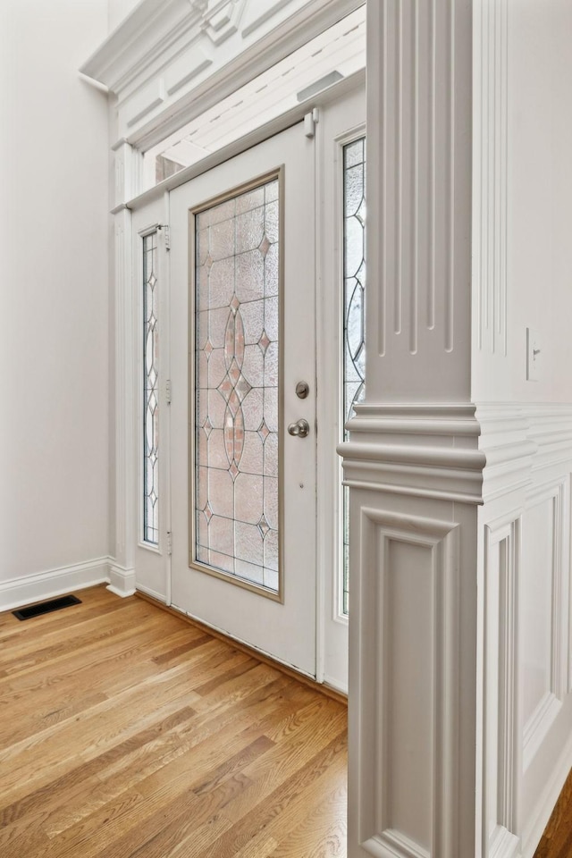 foyer entrance featuring light hardwood / wood-style floors