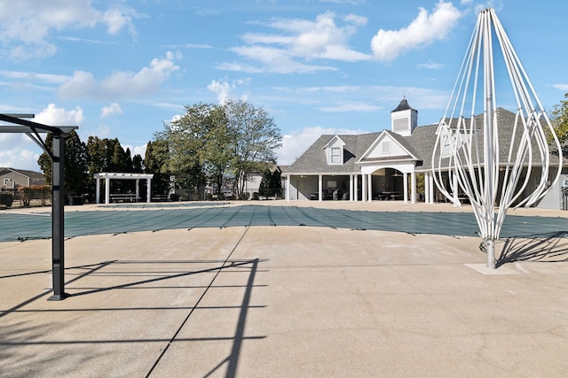 view of swimming pool with a pergola and a patio area