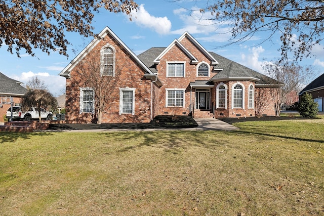 view of front property with a front lawn