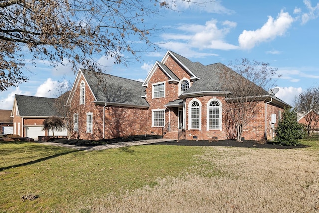 front of property featuring a garage and a front yard