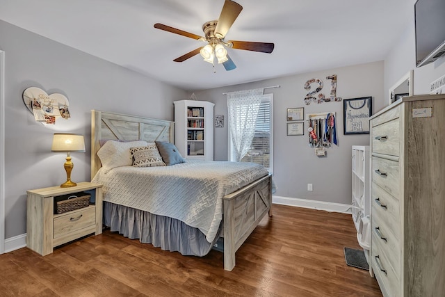 bedroom with wood-type flooring and ceiling fan