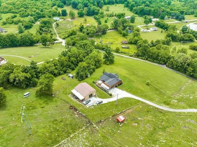 birds eye view of property featuring a rural view