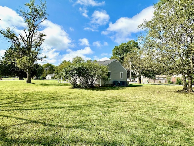 view of yard featuring central AC unit