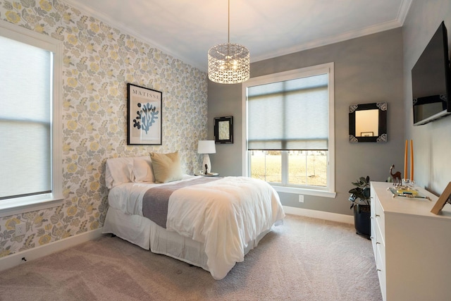 carpeted bedroom featuring crown molding