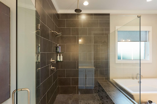 bathroom with crown molding and shower with separate bathtub