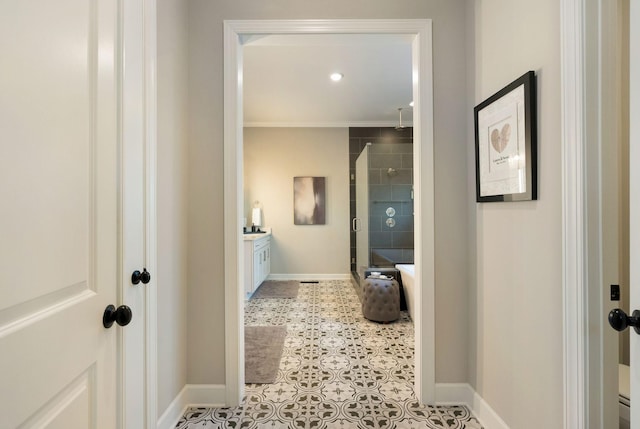 bathroom with tile patterned floors, vanity, and a shower with door