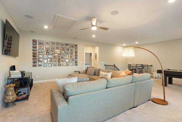 living room featuring carpet floors and ceiling fan