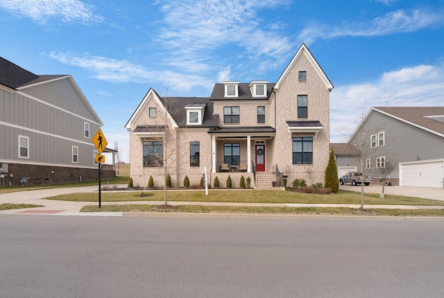 view of front of house with a porch and a garage