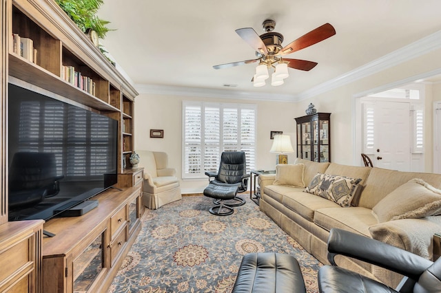 living room with crown molding, ceiling fan, and hardwood / wood-style flooring