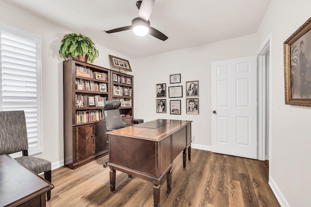 office area with hardwood / wood-style flooring and ceiling fan