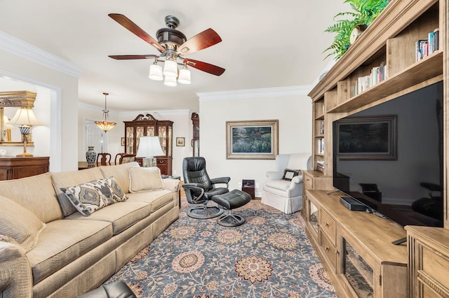 living room with crown molding and ceiling fan