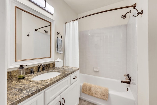 bathroom with shower / bathtub combination with curtain and vanity