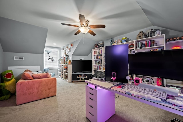 interior space with lofted ceiling, carpet floors, and ceiling fan