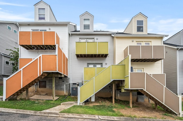 rear view of property with central air condition unit