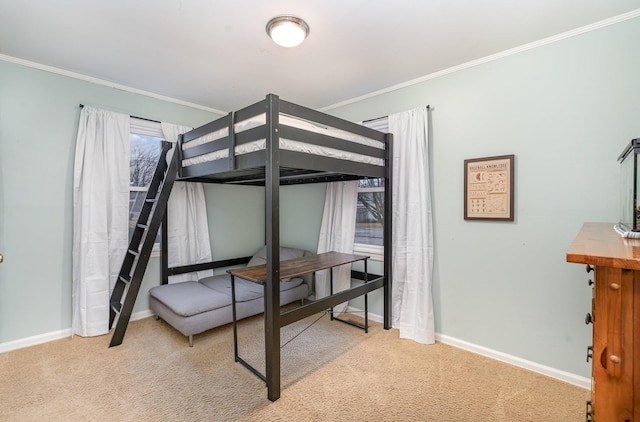 carpeted bedroom featuring crown molding