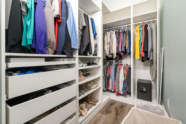 spacious closet featuring hardwood / wood-style floors