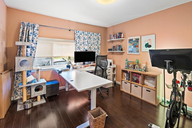 office with dark hardwood / wood-style flooring